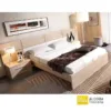 cama con mesas de noche y colchón